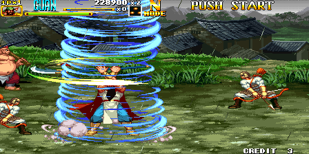 A warrior character stands center-screen surrounded by a bright blue spiral magical effect. The 2D pixel art landscape behind shows grass terrain and structures. Enemy characters are positioned to the right. The arcade UI displays the score at top-left, currency value of 224800, and a health/status bar. Text reading 'PUSH START' appears in the upper right corner. The color palette features vibrant greens, blues, and flesh tones typical of early 2000s arcade sprite graphics.