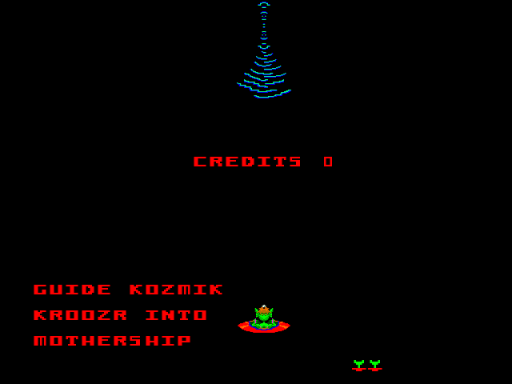 A black screen displays a blue wireframe pyramid at the top center. Red text reading "CREDITS 0" appears in the upper portion. On the left side, red text reads "GUIDE KOZMIK KROODZER INTO MOTHERSHIP" vertically stacked. A small green and red pixel sprite resembling a spacecraft sits in the center-right area. Two yellow pixel dots appear in the lower right corner against the black background.