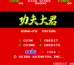 The title screen displays large yellow pixelated characters spelling "Kung-Fu Taikun" in the center against a black background. A red banner spans the top with score information and arcade operator text in green. Below the title, English and Japanese text identify the game. The lower section shows coin and credit displays in red text on the left, with a Seibu Kaihatsu copyright notice and 1954 date at the bottom center, all rendered in typical arcade bitmap font style on a pure red background.