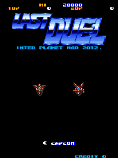 The title screen displays "LAST DUEL" in large blue pixelated letters at the center-top, with "INTER PLANET WAR 2012" in smaller cyan text below. The top-left corner shows "1 UP" and score displays reading "0" and "20000". Two identical red and brown insectoid sprites face each other in the middle-lower portion of the black screen. A Capcom copyright notice appears at the bottom-left, with "CREDIT 0" in cyan text at the bottom-right.
