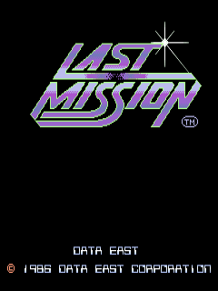 The title screen displays a purple and blue metallic logo reading 'LAST MISSION' with a bright starburst effect in the upper right corner. Below on a black background, white text reads 'DATA EAST' with a small copyright symbol and '1986 DATA EAST CORPORATION'. The logo uses an italicized, angular font typical of 1980s arcade graphics, and a registered trademark symbol appears to the right of the title.