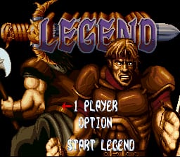 The title screen displays the word "LEGEND" in large purple and gold lettering at the top center, with ornamental golden spikes flanking both sides. Below the title, a muscular male character with brown skin and blonde hair is shown from the shoulders up, positioned centrally. Three menu options appear in white text on the left side: "1 PLAYER", "OPTION", and "START LEGEND". The background is solid black, and the overall art style uses 16-bit SNES sprite graphics with warm orange and gold tones dominating the character and logo design.