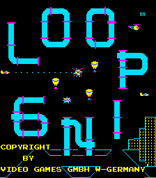 The title screen displays "LOOP" in large cyan pixel letters arranged vertically on a black background. Several small yellow and green sprites are scattered across the screen, with a pink sprite visible in the upper right. Yellow copyright text reading "COPYRIGHT BY VIDEO GAMES GMBH N-GERMANY" appears at the bottom. A dotted horizontal line runs across the middle of the screen, and small pixelated building shapes are visible along the lower edge. The overall composition uses a cyan and black color scheme typical of early 1980s arcade graphics.