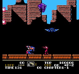 A blue humanoid character with a cape floats in mid-air above a brown wooden platform structure set against a black lower half and bright blue sky. A purple winged enemy appears above the platforms. The HUD displays score 00, lives remaining as 13, top score 100000, and current level 00 charge 1 at the bottom of the screen. The art style uses 8-bit NES-era sprites with limited color palette and pixelated details throughout the scene.