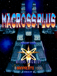 The arcade title screen displays "MACROSS PLUS" in large blue and red pixelated letters at the top, with a glowing yellow star symbol centered below. Two tall blue spacecraft structures flank the title against a starfield background. At the bottom, white text reads "INSERT COIN" above yellow text stating "©1995 BIG.EAST" and "©BANPRESTO 1996" with "CREDIT 0" shown. The overall color scheme uses dark blue, cyan, and yellow against black space, typical of mid-1990s arcade graphics.