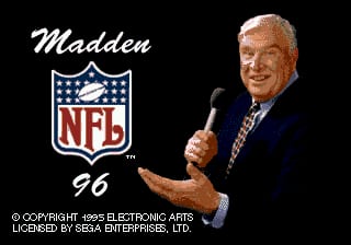 The Madden NFL 96 title screen displays a smiling man in a dark blazer holding a microphone on the right side against a black background. The official NFL shield logo appears center-left in white, blue, and red. White script text reading "Madden" sits in the upper left, with "96" positioned below the shield. Copyright text for Electronic Arts and Sega Genesis appears at the bottom in small white font.