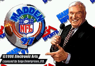 A man in a dark blazer and checkered shirt holds a microphone and gestures toward the left side of the screen. Behind him is the Madden NFL 97 logo in blue and red with a football graphic, set against a white circular background. At the bottom, text reads "©1996 Electronic Arts Licensed by Sega Enterprises,LTD." The overall composition is a promotional-style title screen with the figure and branding as the central visual elements.