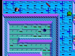 A 3D maze viewed from above with a purple-outlined border frame. The maze interior displays horizontal green striped corridors with dark blue walls. A small character sprite appears in the upper-left area of the maze. The right side of the screen shows a blue grid interface with multiple rectangular cells, likely a minimap or status display. The overall color scheme uses cyan, blue, green, and purple with low-resolution pixelated graphics typical of early SMS-era games.