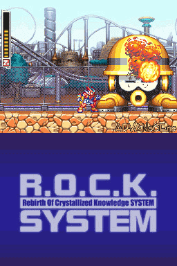 A split-screen image showing the top half as a game level with an amusement park theme featuring a large yellow and orange mechanical sphere robot on a platform with chain-link fencing, roller coaster tracks, and a city skyline in the background rendered in 16-bit pixel art. The bottom half displays the R.O.C.K. SYSTEM title logo in white text on a dark blue background, identifying this as Mega Man ZX for Nintendo DS.
