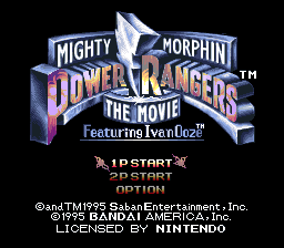 The title screen displays the Mighty Morphin Power Rangers logo in large blue and purple text at the top center, with a stylized ranger helmet graphic. Below reads "The Movie" and "Featuring Ivan Ooze" in smaller text. Two menu options appear at the bottom: "1P START" and "2P START" in pixelated white font. Copyright information is shown at the very bottom. The background is solid black, and the overall presentation uses the Game Boy's monochromatic green-tinted color palette typical of early cartridge games.