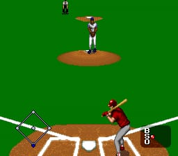 A baseball field view shows a batter in red uniform at home plate with a bat raised, positioned on the right side of the brown diamond. The pitcher in white uniform stands on the mound in the upper center. A small infield view floats above showing the pitcher's full stance. The green outfield surrounds the field, with white baseline markings visible. A score display showing "8 8" appears in the lower right corner. The graphics use 16-bit sprite-based visuals typical of early-1990s sports games.