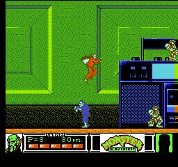 A red-clothed character stands in a bright green room with darker green walls and doorways. Below, a blue character approaches from a black floor section. The bottom of the screen displays a multi-color UI panel with health/status bars in orange and green, a face portrait on the left, and weapon or item indicators on the right. Pixelated 8-bit sprite graphics with a limited NES color palette throughout. The level uses vertical and horizontal rectangular rooms connected by visible doorways.