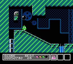 A green character stands on a diagonal platform in the center of a black interior level. Blue outlined rectangular rooms are visible in the background, with a grappling hook or similar projectile shown mid-flight. The foreground shows a white platform structure on the left. At the bottom, a status bar displays the score (5005740), the word RESET, health indicators represented by colored dots, and three empty squares. The overall art style uses 8-bit sprite graphics with a diagonal-striped green exterior visible on the right side of the screen.