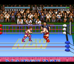 A wrestling match in progress on a blue-matted ring with red barriers and a crowd of spectators visible in the background arcade-style stands. Two wrestlers in red and blue attire are positioned in the center ring, with a third wrestler in blue on the right side. The top of the screen displays the score "ASTERO 0" and "CONDO" with time remaining at 9:58. A pink health bar or match indicator stretches across the bottom of the screen. The sprite work shows the characteristic low-resolution pixel art and limited color palette typical of early 1990s SNES wrestling games.
