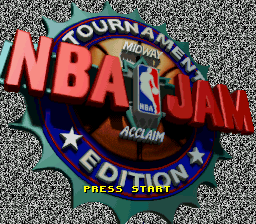 The title screen features a large red 'NBA JAM' logo at the center, with 'TOURNAMENT EDITION' text curved above it inside a circular badge. A blue basketball rim with the NBA shield occupies the center of the design, surrounded by red and orange rays. Two white stars flank the sides, and the word 'ACCLAIM' appears at the bottom of the circular emblem. The background is dark with a textured pattern. White text reading 'PRESS START' is visible at the bottom of the screen, and the overall color scheme uses bright reds, blues, and oranges typical of early 1990s arcade game aesthetics.