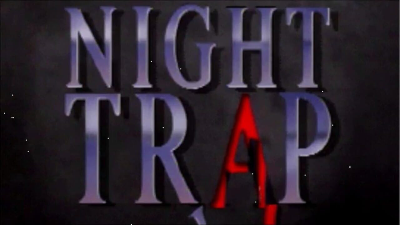 The title screen displays "NIGHT TRAP" in large purple capital letters with a bright red "A" replacing the middle letter. Small white dots scatter across the dark background like stars or particles. The text uses a bold, three-dimensional font style with shading effects typical of early-1990s computer graphics.