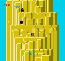 A vertical maze layout fills the screen with bright yellow walls and passages against a cyan background. A player character sprite stands in the middle-lower section of the maze. Two enemy sprites appear as small dark figures positioned at different points within the corridors. The level design features interconnected rectangular chambers and narrow pathways forming a complex navigational puzzle in 8-bit pixel art style typical of mid-1980s NES games.