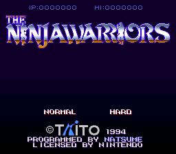 The Ninja Warriors title screen displays the game logo in large blue and gold lettering against a dark purple background. Below the title are two difficulty options labeled 'NORMAL' and 'HARD' separated by a vertical line. At the bottom, copyright information reads '© TAITO 1994' with credits stating 'PROGRAMMED BY NATSUME' and 'MUSIC BY' followed by additional text. The entire interface uses a pixel-art font typical of early 1990s SNES games, with a simple, centered layout against the solid-colored background.