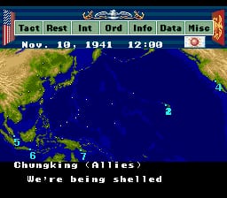 A blue ocean map fills the center of the screen with a green-landmassed coastline visible along the top and left edges. A small naval icon sits in the middle of the water. The top menu bar displays text options for Test, Reset, Int, Ord, Info, Data, and Misc in white font against a dark background. Below the map, white text reads "Chutnooking (Allies)" and "We're being shelled." The date "Nov. 10. 1941 12:00" appears in the upper left corner. The color palette consists primarily of dark blue ocean, green land, and white UI elements typical of early 1990s SNES strategy game graphics.