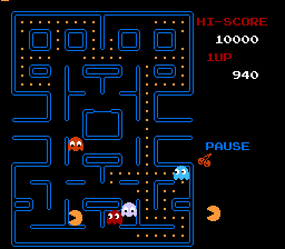 A blue-and-black maze layout fills the center of the screen with Pac-Man (yellow sprite) positioned in the middle-left corridor. Four ghosts—orange, pink, cyan, and red—are scattered throughout the maze at various positions. The top-right corner displays a black panel with white text reading "HI-SCORE 10000" and "940" below it. A blue "PAUSE" label appears in the upper right. The maze features small dots throughout and larger power pellets at key intersections. All graphics are rendered in low-resolution 8-bit pixel sprites typical of NES-era games.