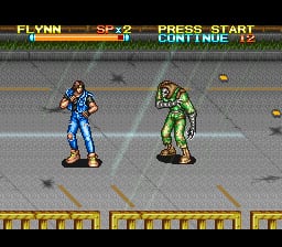 Two pixel-art characters stand facing each other on a street scene with yellow lane markings. The left figure wears a blue outfit and the right figure wears green. At the top, a heads-up display shows health bars labeled "FL:YNN" and "SFK9" with a score of 390, plus menu options for "PRESS START" and "CONTINUE." The background shows a gray asphalt road with brown building details. A row of yellow boxes spans the bottom of the screen, typical of the SNES sprite and tile-based visual style from the early 1990s.