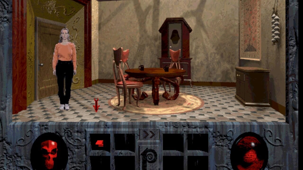 A woman in an orange top and black pants stands in a furnished room with patterned tile flooring. A wooden dining table with two red chairs sits in the center, with an ornate mirror and dark wooden cabinet visible in the background. The room features textured wallpaper, decorative wall sconces, and period furniture. At the bottom of the screen, a dark interface frame displays skull imagery and inventory slots. The graphics use 3D character models with pre-rendered backgrounds typical of mid-1990s point-and-click adventure games.