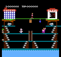 A multi-tiered industrial platform stage displays Popeye centered on the second level from bottom, with Olive Oyl positioned on an upper platform to the right. Donkey Kong occupies the top level near a wooden barrel structure. The score display at top shows 1000000 points and TOP-000000, with a lives counter and musical note icon visible. Blue girders and wooden platforms form the level structure against a black background, with water rendered in light blue at the bottom. Pixelated 8-bit sprites and a limited color palette are characteristic of the NES visual style.
