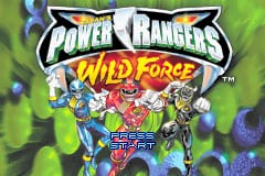 The title screen displays the Power Rangers Wild Force logo prominently at the top in white and yellow lettering. Below sits a group of five colorful ranger characters in their suited forms, arranged in a dynamic pose against a green background. The rangers wear distinct colored uniforms—red, blue, yellow, white, and pink. Additional UI elements appear at the bottom including the GBA Cartoon Network logo and a red start button prompt. The overall art style uses bright, bold colors typical of GBA sprite-based graphics.
