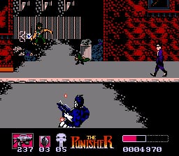 A character in blue clothing stands in the center of a gray platform, with black enemies scattered across the scene. Red brick walls and dark red textured areas form the background. A black chasm divides the lower portion of the level. The HUD displays health bars, a score counter showing 0030970, and weapon icons in the bottom-left corner. The sprite-based graphics use a limited NES color palette with red, blue, black, and gray tones against a black background.