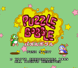The title screen features large yellow bubble letters spelling 'PUZZLE BOBBLE' against a light green background, with pink and yellow stars scattered around. Below the title, two small sprite characters appear—a green turtle-like creature on the left and a pink character on the right. Japanese text and 'PUSH START' prompt are centered beneath, followed by copyright information for Taito from 1995. The pixel art uses bright, solid colors typical of mid-1990s sprite-based graphics.