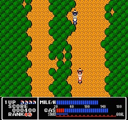 A top-down view of a motorcycle rider on a tan-colored road with a repeating pattern. Green grass forms the border on both sides with small brown shrubs scattered throughout. The HUD displays at the bottom shows the game title, a blue fuel bar, speed indicator reading 140, current lap information, and a red gear indicator. The rider sprite is centered on the screen, positioned on the middle section of the road.