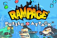 The title screen displays 'RAMPAGE' in large orange lettering at the top center, with 'PUZZLE ATTACK' in smaller text below it. A pixelated cityscape with tall buildings forms the background. Colored falling blocks in red, green, and blue appear in the upper portion. A cartoon character with a large head wearing casual clothing stands in the lower right area. The background is bright blue, and a 'PRESS START' prompt is visible at the bottom center in dark text.