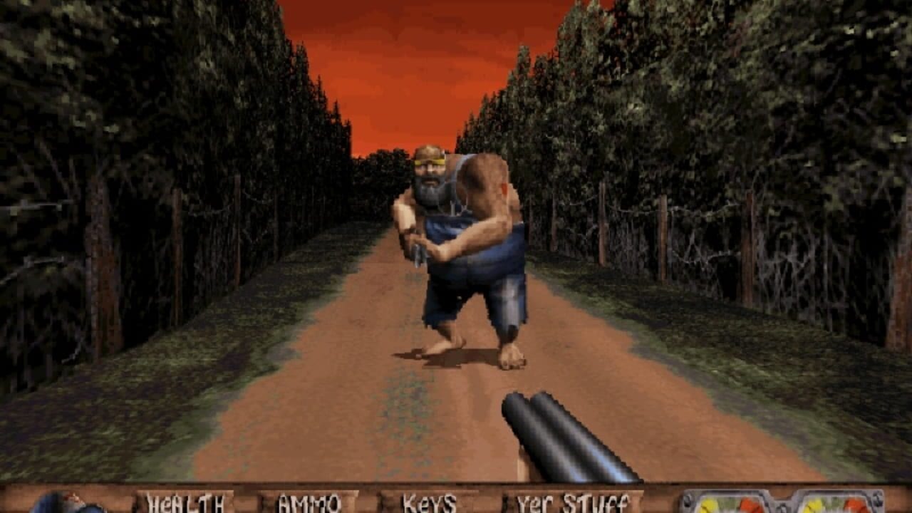 A first-person perspective shows a shirtless character holding a rifle in the foreground, aimed at an enemy figure in the distance. The enemy, a bald man in dark clothing, approaches along a straight dirt road lined with tall dark cypress-like trees on both sides. An orange-red sky fills the horizon. The bottom of the screen displays a HUD with weapon status and game information. The 3D geometry uses low-polygon models with pixelated texture work typical of mid-1990s DOS games.