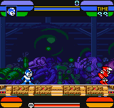 Mega Man stands on a tan platform at screen center, facing right toward a red robot enemy in the lower right. Purple spiky terrain and obstacles fill the middle ground against a dark blue underwater or cave-like background. The top HUD displays health bars for both Mega Man and the boss in blue and red, along with weapon icons. The bottom orange status bar shows remaining time and additional game information. Sprite-based graphics use a limited color palette typical of NGPC hardware.