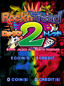 The title screen displays 'Rock'n Tread 2' in large red and yellow gradient lettering at the center, with a prominent green number 2 below it. Colorful arcade cabinet artwork surrounds the title, featuring stylized characters and neon-colored elements in red, blue, and yellow. Japanese characters appear beneath the English title. At the bottom, copyright text reads '©1999 JALECO ALL RIGHTS RESERVED' in white. Two lines of coin/credit information display: '1 COIN(S) - 1 CREDIT' at the top and '0 COIN(S) - 0 CREDIT(S)' at the bottom in yellow text. The background is predominantly black with pixelated arcade graphics.