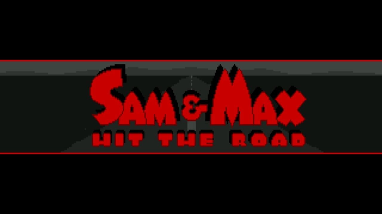 The title screen displays 'SAM & MAX' in large red pixelated letters with black outlines, positioned in the upper-center area against a dark gray background. Below the main title, 'HIT THE ROAD' appears in smaller red text. Red horizontal lines frame the title area at top and bottom, creating a band effect across the screen. The overall image uses a limited color palette typical of early 1990s DOS graphics, with pure black filling the upper and lower portions of the screen.