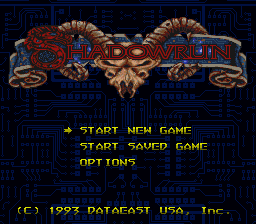 The title screen features a large ornate logo at the top center with red and gold ornamental designs flanking the word "Shadowrun" in yellow lettering. Below the logo, a dark blue background displays a menu in yellow text listing three options: "START NEW GAME", "START SAVED GAME", and "OPTIONS". At the bottom left, white text reads "(C) 1993 DATAEAST USA, Inc." The overall design uses a 16-bit sprite aesthetic with a dark blue pixelated background pattern.