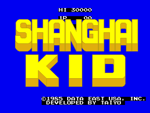 The title screen displays 'SHANGHAI KID' in large yellow pixelated text centered on a solid blue background. Above the title, a score counter reads 'HI 50000' with 'IN' and 'OUT' labels. Below the main title, white text credits read 'SHANGHAI KID DEVELOPED BY TAIYO SYSTEM,' followed by 'DATA EAST LICINCED' and 'DISTRIBUTED BY DATA EAST U.S.A. INC.' in smaller font. The entire layout uses a simple arcade-style presentation with primary colors and blocky typography typical of mid-1980s arcade cabinets.