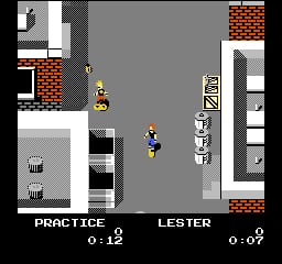 A skateboarding character in yellow stands on a gray street surrounded by brick buildings and gray structures. The screen displays two skaters labeled "PRACTICE" on the left with a score of 0:12 and "LESTER" on the right with 0:09. The character sprites are small and pixelated against an 8-bit urban environment with red brick walls, gray concrete elements, and simple rectangular buildings in a birds-eye-view perspective.