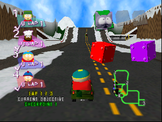 A split-screen racing view displays two players on a wide asphalt road with yellow center lines. The top screen shows a blue-hatted character approaching a green traffic light, while the bottom shows a red-clad character with a green steering wheel outline. Wooden fence barriers and low-poly buildings frame both sides of the track. A UI panel on the left lists four racers with portrait icons and numerical positions. The sky features bright blue coloring with white cloud clusters. All assets display the characteristic low-polygon geometry and texture style of late-1990s Nintendo 64 racing games.