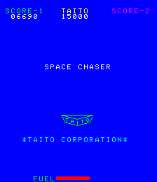 A blue title screen displays "SPACE CHASER" in white text centered on the screen. Above it, score information appears in the top-left corner showing "SCORE 06250" and "SCORE-2 15000" in cyan and magenta text. Below the title, a small green and cyan pixel-art spaceship sprite hovers in the center. At the bottom, "*TAITO CORPORATION*" appears in green text, followed by a red fuel bar indicator labeled "FUEL" in green. The entire background is solid blue, typical of early arcade game aesthetics.