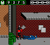A sprite-based gameplay scene shows a red-caped character positioned in the center-left of a brick building interior. The character faces right while a blue platform extends horizontally in the foreground. A green pipe section sits at the bottom left, and a window or light-colored rectangular opening appears on the upper left wall. The HUD displays a score of 09375 and a time counter at the top. The graphics use a limited color palette typical of Game Boy hardware, with brick texture fill across the background walls.