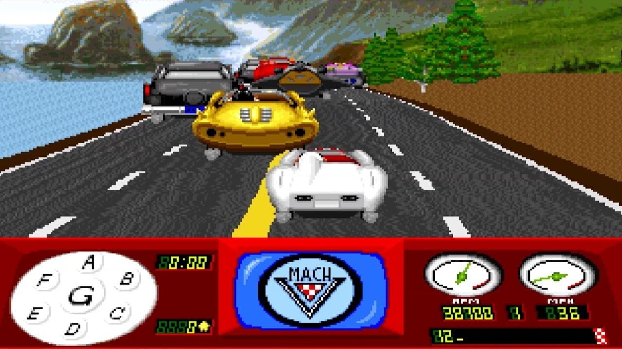 A white car with red accents occupies the center lane of a multi-lane highway during a race. Three competing vehicles—gray, red, and purple—appear ahead on the road. The scene shows a coastal landscape with rocky cliffs, water, green grass, and trees rendered in low-resolution sprite graphics. A red HUD spans the bottom displaying a circular gear-shift diagram on the left, a blue speedometer labeled MACH in the center, and two gauges showing RPM and MPH readings on the right. Digital time counter and lap distance indicators appear in green text above the gauges. Horizontal white lane markings and a yellow center line divide the asphalt road.