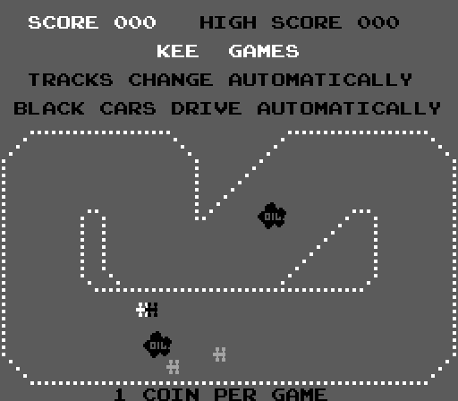 A gray racing game screen displays score and high score at the top as 000. Text instructs that tracks change automatically and black cars drive automatically. A white dotted-line track winds through the playfield with two small black car sprites labeled "OIL" positioned on the track, and a white crosshair marker visible in the center-right area. The track forms a figure-eight pattern with rectangular sections outlined in white dots against the gray background.