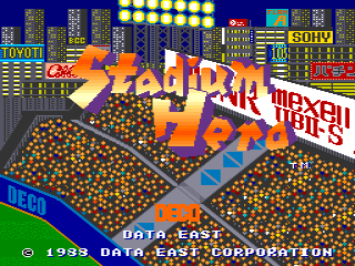 The title screen displays "Stadium Hero" in large orange and yellow letters against a blue sky background with a pixelated city skyline. Below the title, a brown baseball diamond is visible in isometric perspective with scattered yellow dots representing players or game elements. A "Maxell" logo appears in red text to the right. The bottom of the screen shows "DATA EAST" and a copyright notice reading "© 1988 DATA EAST CORPORATION" in white text. A green grass area occupies the lower portion, and UI elements include "DECO" in the bottom left corner.