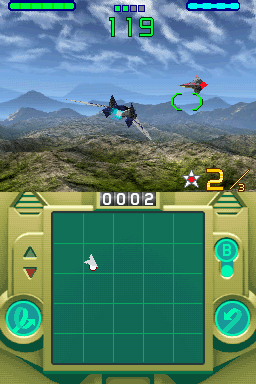 The lower screen displays a green grid-based tactical map with a white cursor in the center. The upper screen shows an airborne fighter jet above a mountainous landscape with blue sky and clouds, with a score of 0002 visible at the bottom left and health bars at the top. The interface features green and teal-colored UI elements on both sides of the lower screen, including circular buttons at the corners and a score counter showing 119 in the upper center.