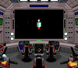 A starship bridge cockpit view displays a central viewport showing a small spaceship sprite against a black space background with a distant planet. The surrounding cockpit interface features dual control consoles on either side with colored buttons and displays in reds, greens, and blues. The upper portion shows instrument panels and status readouts arranged symmetrically. The bottom edges display illuminated console sections with orange warning lights on the lower corners. The overall scene uses a dark color palette with bright accent colors typical of early 1990s SNES graphics.