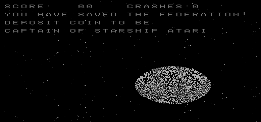 A black background displays white text at the top reading "SCORE: 0.0", "CRASHES: 0", and "YOU HAVE SAVED THE FEDERATION! DEPOSIT COIN TO USE CAPTAIN OF STARSHIP ATARI". Below the text, a large white pixelated oval or egg-shaped object appears in the center-right portion of the screen against the black starfield, with small white dots scattered across the background representing stars.