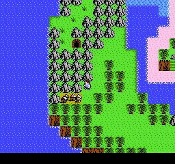 A top-down overhead view of a tropical island landscape rendered in low-resolution pixels. The scene features bright green grass terrain in the center and right portion, surrounded by blue water on the left and upper edges. Dark brown and black trees are scattered across the grassy area in a natural distribution pattern. A pink-white structure or building outline is visible in the upper-right corner. The color palette consists primarily of green, blue, brown, and black with some pink accents, typical of NES-era sprite graphics.