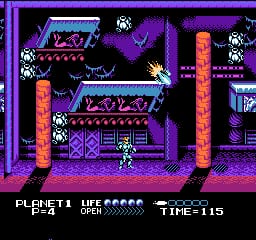 A pixel-art platformer level displays a white humanoid character standing on a purple and magenta checkerboard platform in the center-left area. Tall red vertical structures flank the stage on both sides. The background features purple diagonal line patterns and scattered white enemy sprites positioned throughout the upper platforms and ledges. The UI shows "PLANET 1" and "LIFE" counter in the upper left, with "TIME=115" displayed in the upper right. The color palette consists predominantly of purple, magenta, red, and white on a dark background, characteristic of NES-era graphics.